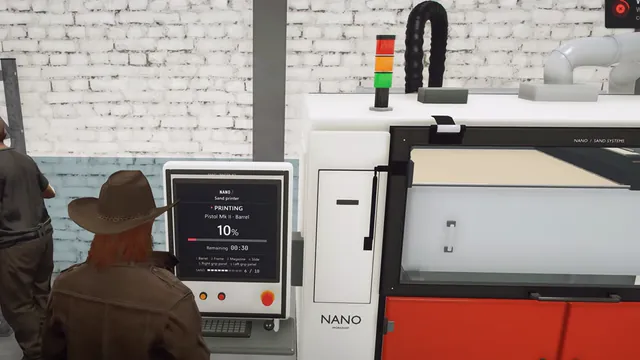 Sand printer printing the mould of a gun part